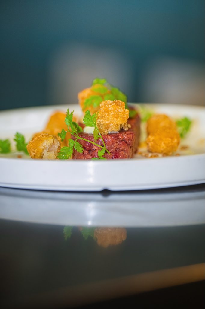 Dine & Drive 2025 – exklusives Unternehmer-Dinner in der Burger & Lobster Bank München mit Sportwagen und Networking.